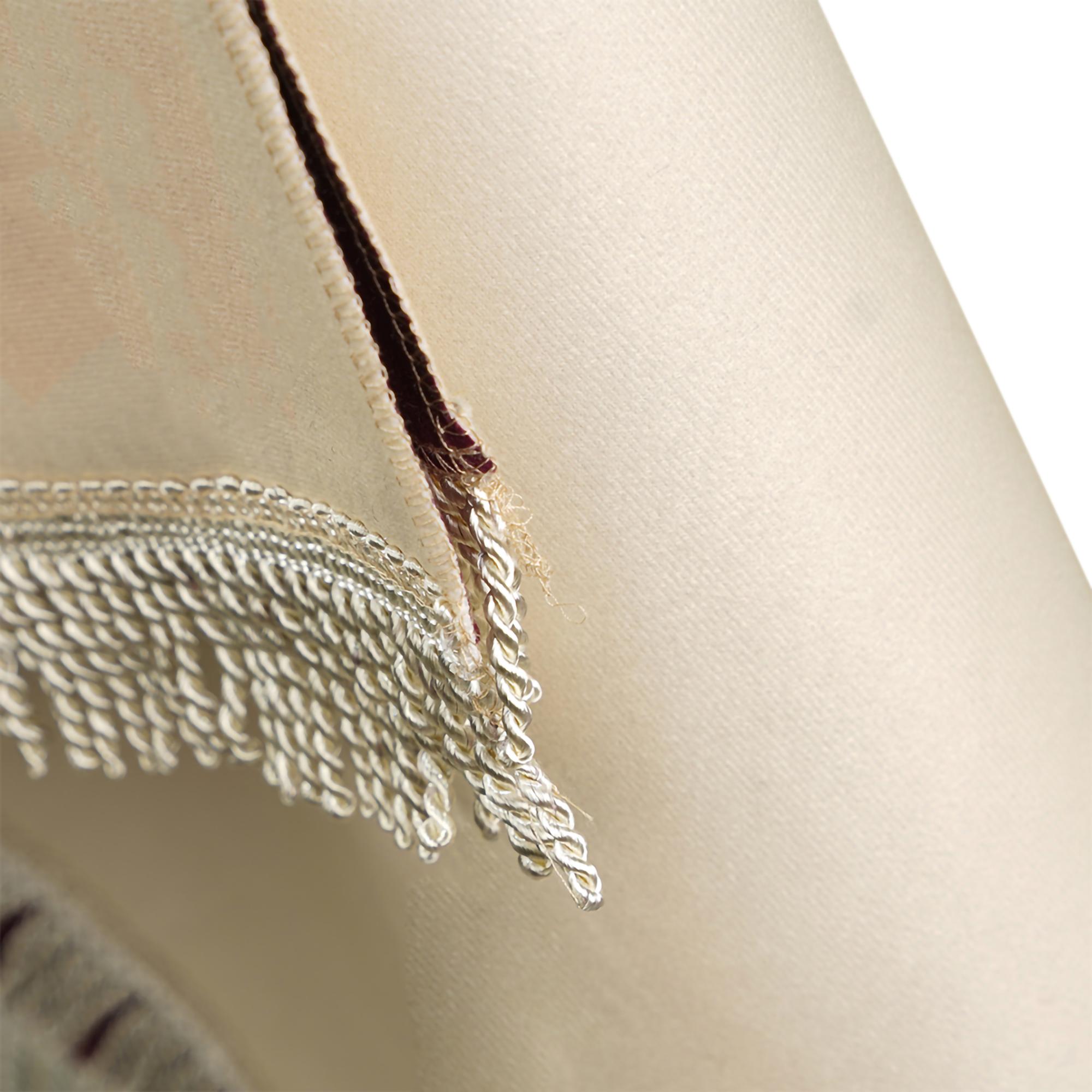 Detailed silk thread stitch close-up